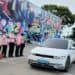 An electric vehicle, participating in the first Korea Peninsula Peace Road Electric Vehicle Drive, departs from Imjingak Pyeonghwa Nuri Park in Paju, Gyeonggi Province, on Monday. (IEVE)