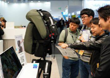 An official from Safeware introduces C3, a fall accident protection airbag, to visitors at the IFA Global Market. (Image courtesy: Safeware)