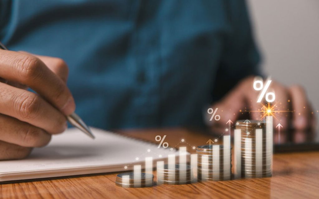 Illustration of startup founder calculating figures. | Stock Photos