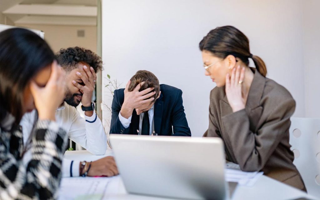 Illustration of startup founders facing investor pressure. | Stock Photos